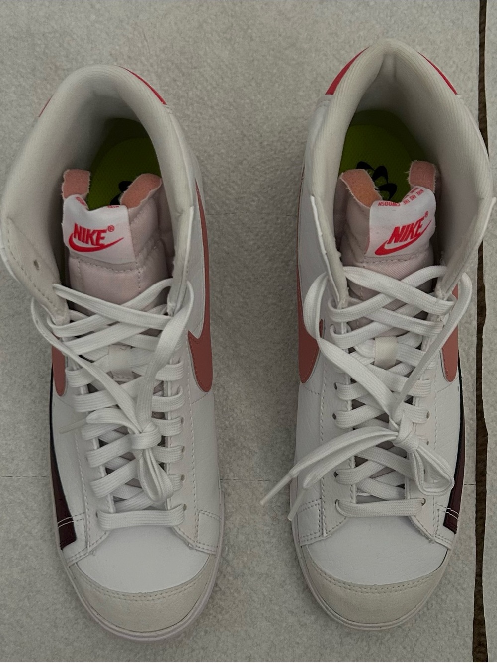 Nike Women’s White and Pink High-Top Sneakers